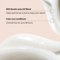 Suave keratin creamy conditioner texture on hand showing smooth application benefit