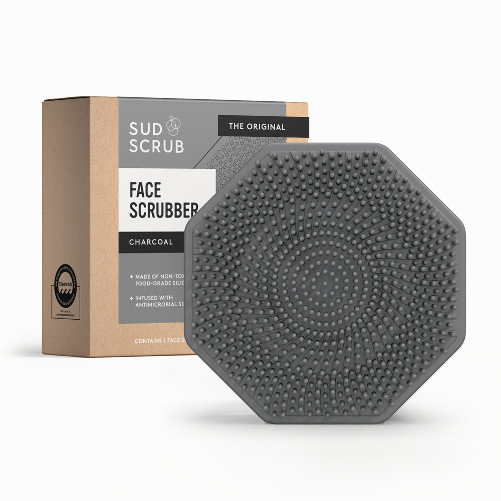 Sud Scrub front view showing charcoal silicone scrubber and portably compact design benefit