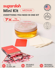 SUGARDOH reusable applicator and cloth strips arranged for quick start