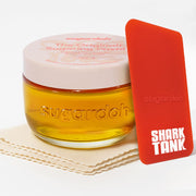 SUGARDOH jar front view showing label and compact size, highlights portability
