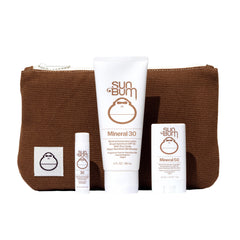Sun Bum front packaging of Road Tripper kit showing all items and travel pouch benefit