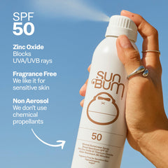 Sun Bum mineral spray on arm showing white cast for visible, reliable coverage