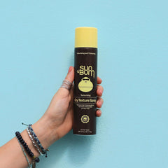 Sun Bum texture spray nozzle close-up highlighting fine mist for even coverage