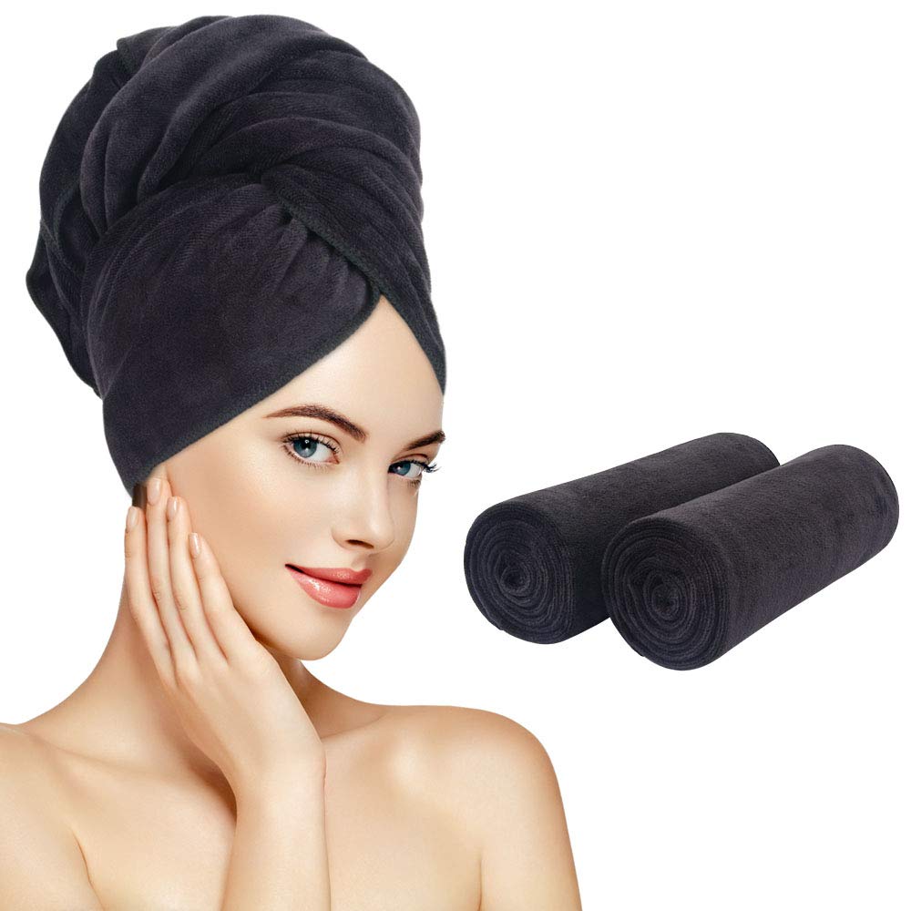 SUNLAND front packaging showing two black towels and compact benefit