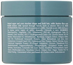 Surface texture paste in hands being worked between fingers for easy application and control