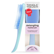 TANGLE TEEZER front view showing denim blues finish and ergonomic grip benefit
