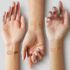 tarte swatch of light sand on skin demonstrating natural brightening effect