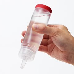 TENGA Red poured texture close-up highlighting silky, non-sticky glide