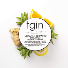 tgin being applied to damp curls, benefits detangling and definition