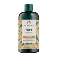 The Body Shop ginger shampoo front bottle showing label and size benefit: clear product info