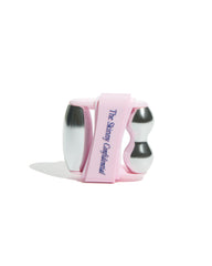 The Skinny Confidential roller in use on face demonstrating depuffing and soothing action