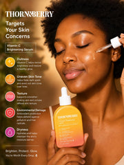 THORN & BERRY glossy serum texture on skin showing non-greasy finish
