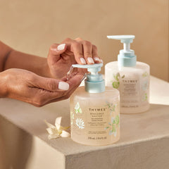 Thymes hand wash staged beside sink in kitchen for aesthetic and functional use