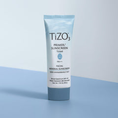 TIZO TiZO3 tube beside ruler showing 1.75 oz size