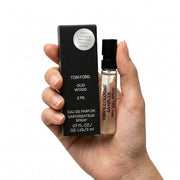 Tom Ford Oud Wood front vial showing sleek label and travel convenience