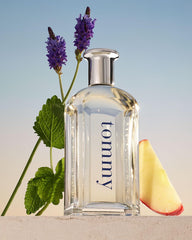 Tommy Hilfiger fragrance ingredients flatlay with mint, apple and flowers benefit: shows scent character