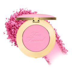 Too Faced compact front view showing Candy Clouds shade and travel benefit