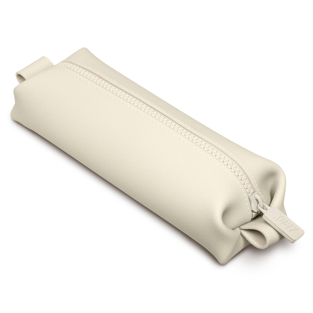 TOOLETRIES Koby Mini front view showing compact silhouette and modern sand color benefit: easy packing