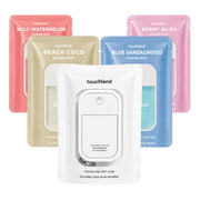 Touchland front packaging showing four scent bottles and case for easy gifting