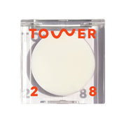 Tower 28 SuperDew front packaging showing compact dewy balm and clean design benefit