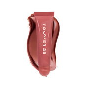 tower 28 LipSoftie front of tube showing label and rosy-nude shade benefit