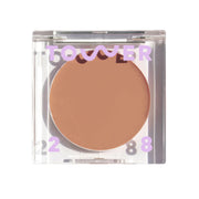 Tower 28 front packaging showing compact bronzer balm, clear neutral shade benefit