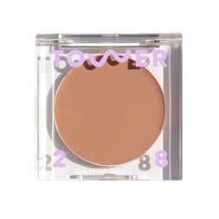 Tower 28 front packaging showing compact bronzer balm, clear neutral shade benefit