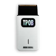 TPOB Mini Skull front view showing compact white design and button for easy carrying