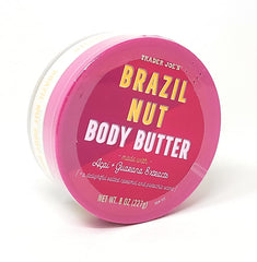 Trader Joe's body butter on a bathroom shelf styled with towels showing at-home moisturizing ritual