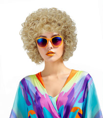 Traqur front view of wig showing light blonde afro and bold volume