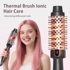 Tresses Touch brush held in hand showing scale and ergonomic grip benefit