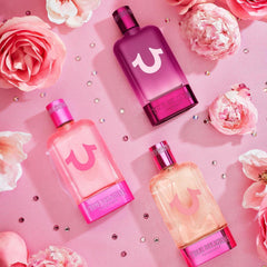 True Religion perfume being sprayed on wrist, demonstrates application and long-lasting wear