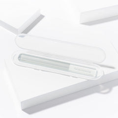 Tweezerman buffer in hand demonstrating easy use and portable beauty benefit