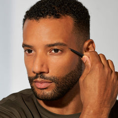 Tweezerman tweezer shaping eyebrow in use for accurate one-stroke removal benefit