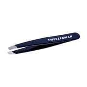 Tweezerman mini slant front view showing compact evening blue design and portability