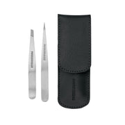 Tweezerman petite set front packaging showing compact case and tweezer duo benefit precision