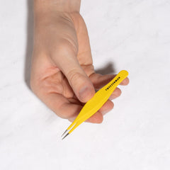 Tweezerman tweezer inside first aid kit demonstrating ready-to-use emergency tool