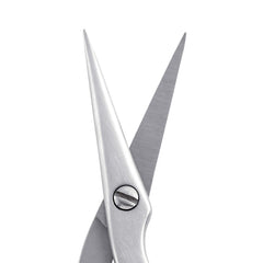 Tweezerman blade closeup highlighting ultra-thin stainless steel for accurate hair trimming