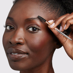Tweezerman spoolie detail showing dense nylon bristles to lift and shape brow hairs