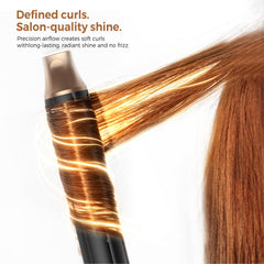 UKLISS right auto-wrap barrel creating uniform curls with less effort