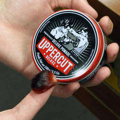 UPPERCUT DELUXE slick back on model offering long-lasting polished hold
