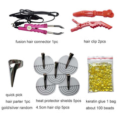 Ushtiger kit accessories laid out with keratin beads and clips for immediate extension installs