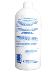Vanicream 32 oz bottle held in hand to show scale and long-lasting supply benefit
