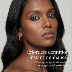 VASANTI swatch on skin showing dense intense-black pigment payoff