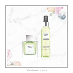 Vera Wang floral ingredients flatlay with pear blossom and green tea for fresh scent cues