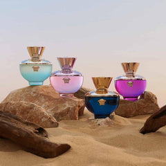Versace Dylan Blush Pink styled flatlay with flowers and fruit to convey fragrance notes and lifestyle vibe