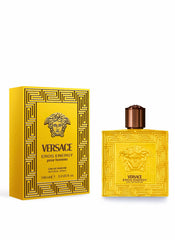 Versace bottle close-up of label and texture highlighting premium finish