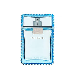 Versace lifestyle shot applying fragrance for fresh daytime confidence
