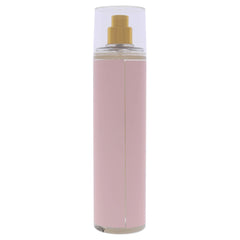 Vince Camuto Bella mist being sprayed on wrist for quick daytime refresh