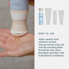 VIRTUE hands applying shampoo to wet hair for soothing scalp care